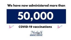 banner noting 50,000th vaccinations at NGH